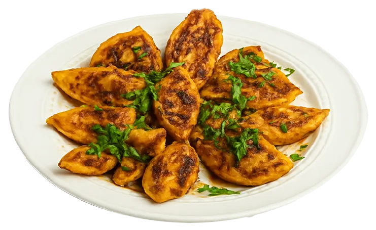 Egg Bites - pan-fried boiled eggs tossed in aromatic Indian spices
